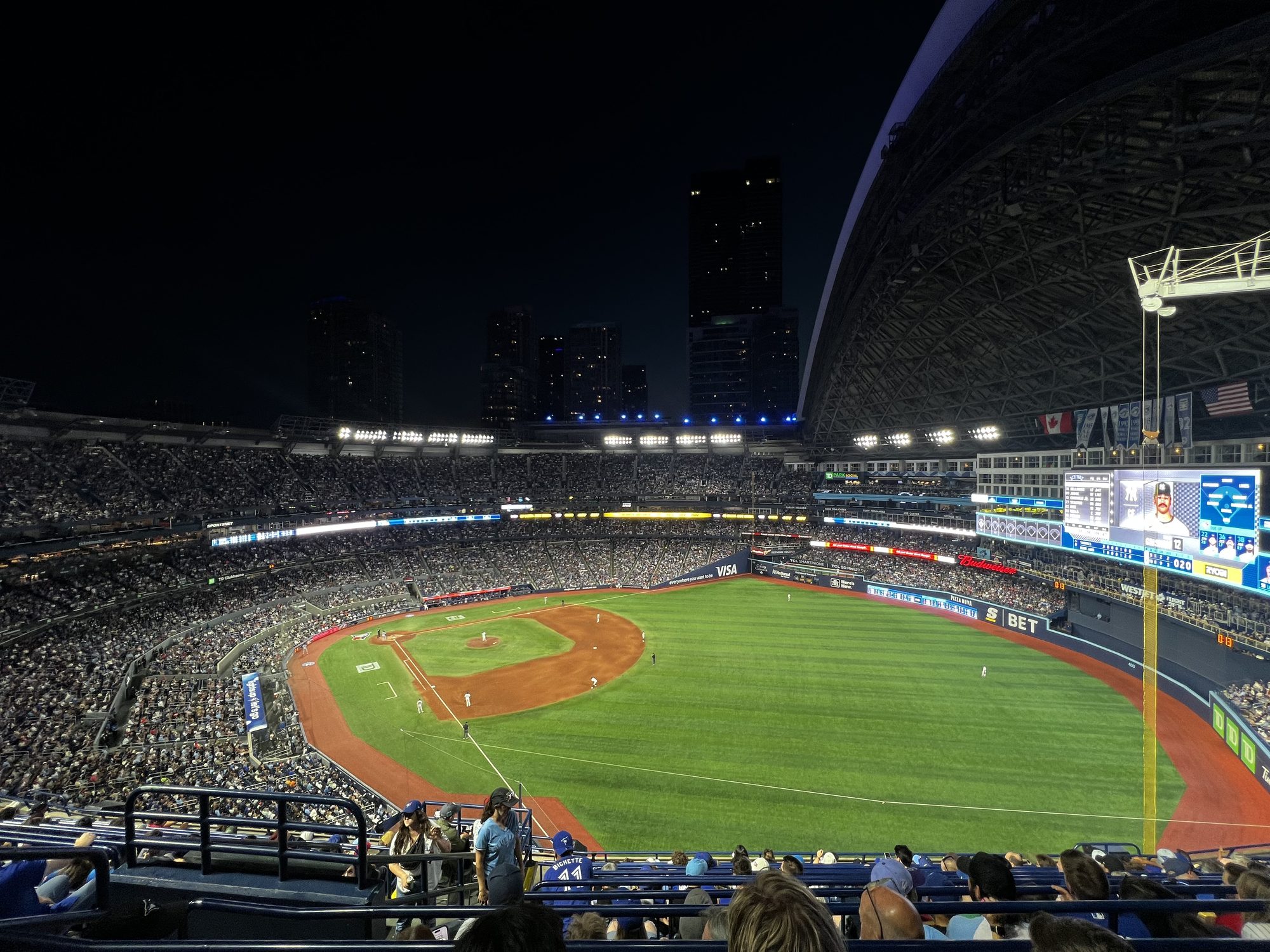 Night game at Rogers Centre with the Toronto skyline